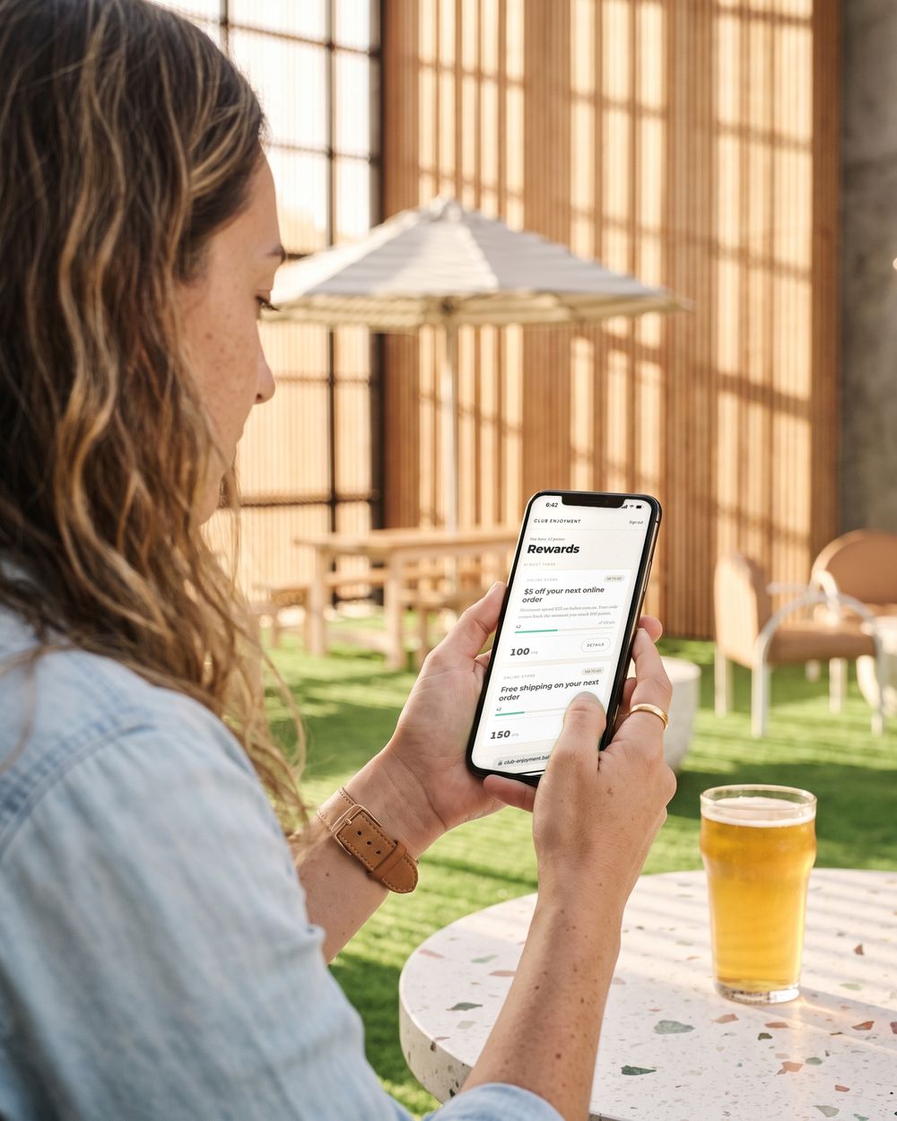 In the beer garden, Sarah's Rewards screen shows the online code paused until she is back over 100 points